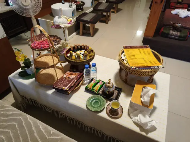 Complimentary tea and snack table near the foot-wash area at Ai Oon Massage Lanna, Chiang Mai